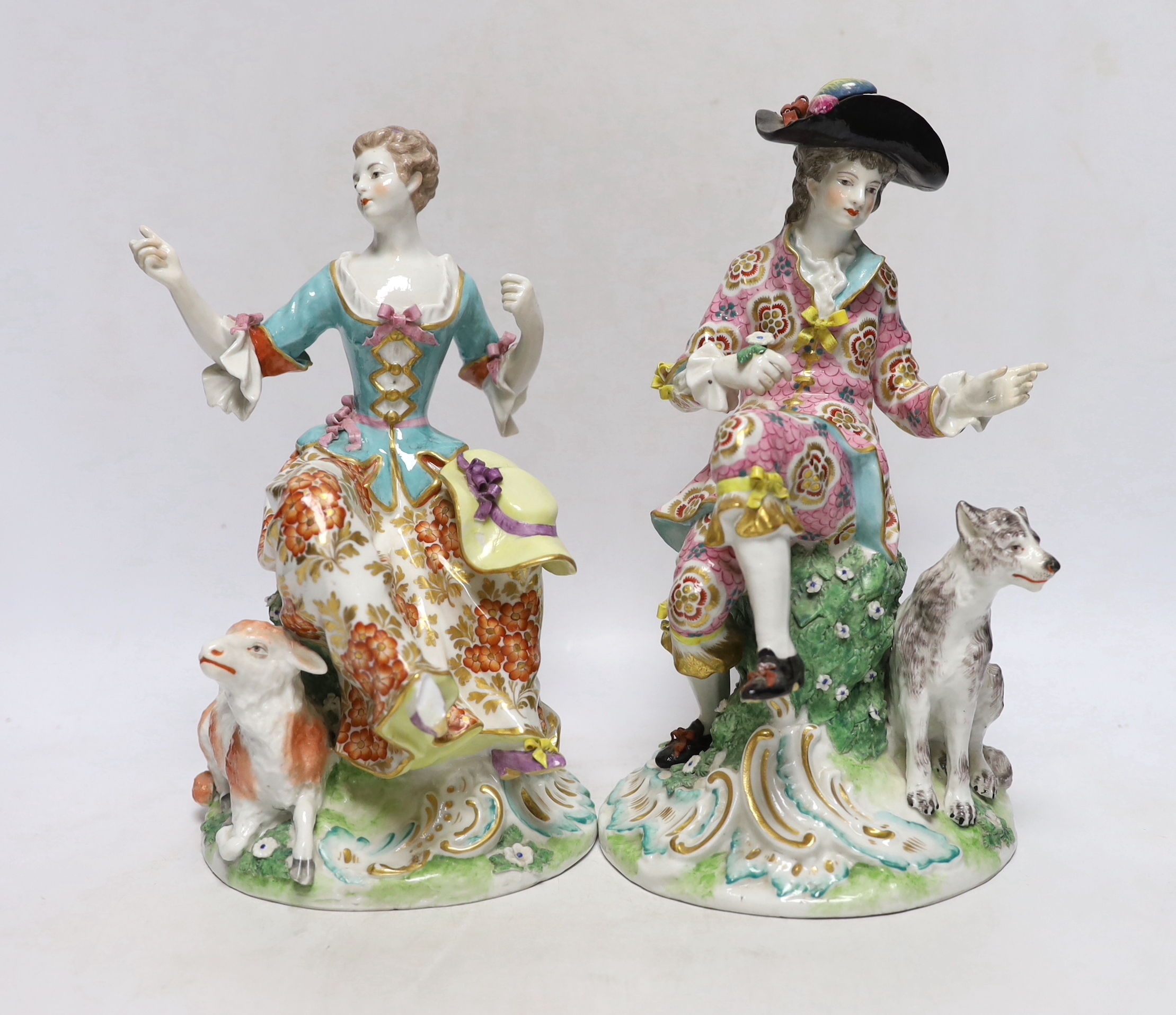 A pair of Samson porcelain figures of a Shepherd and shepherdess wearing 18th century dress, c.1900, largest 27cm high